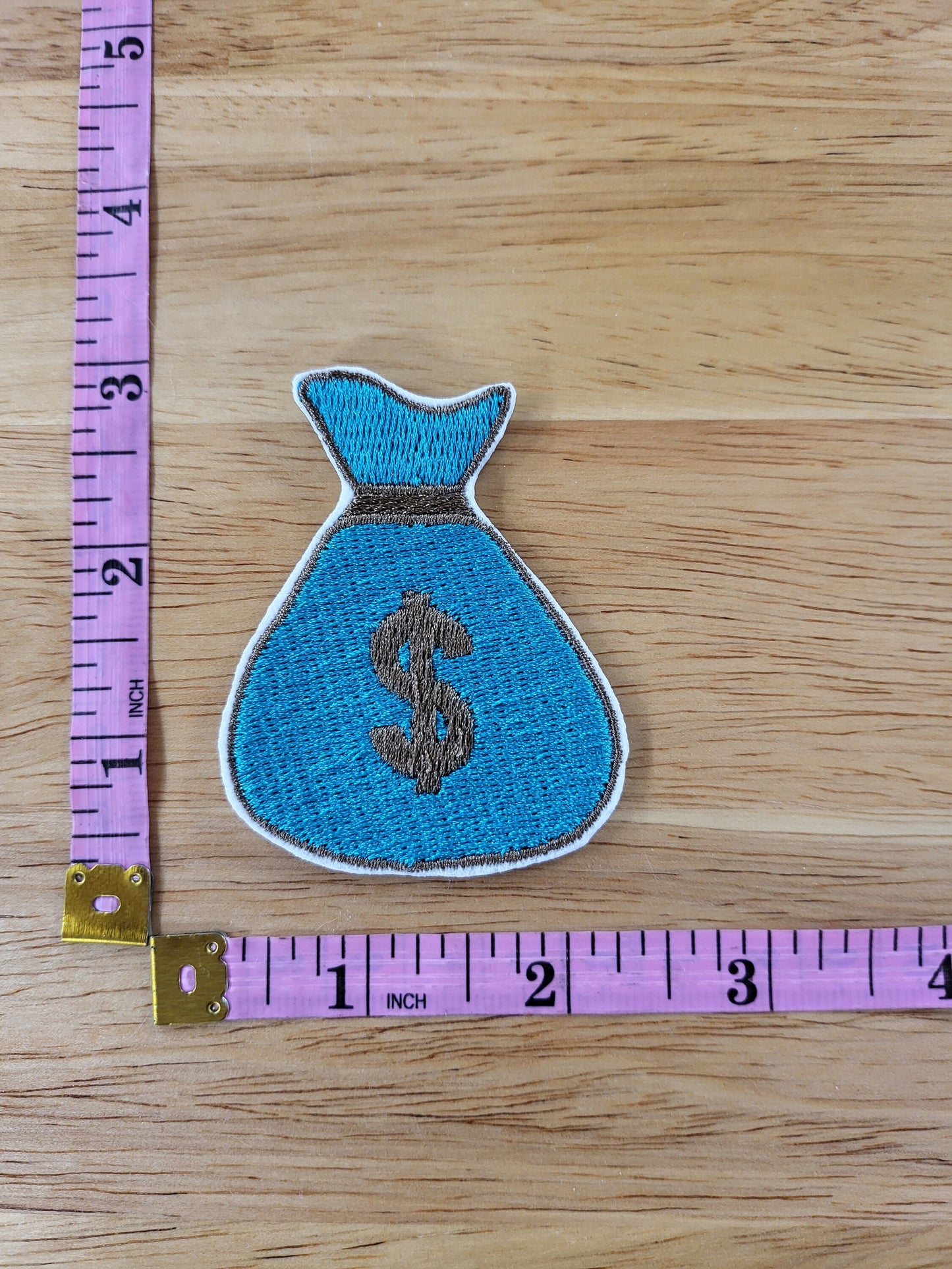 lil' Lucky embroidered iron-on patch set includes 8 ball, dice, Lucky 7s, money bag, and horseshoes.