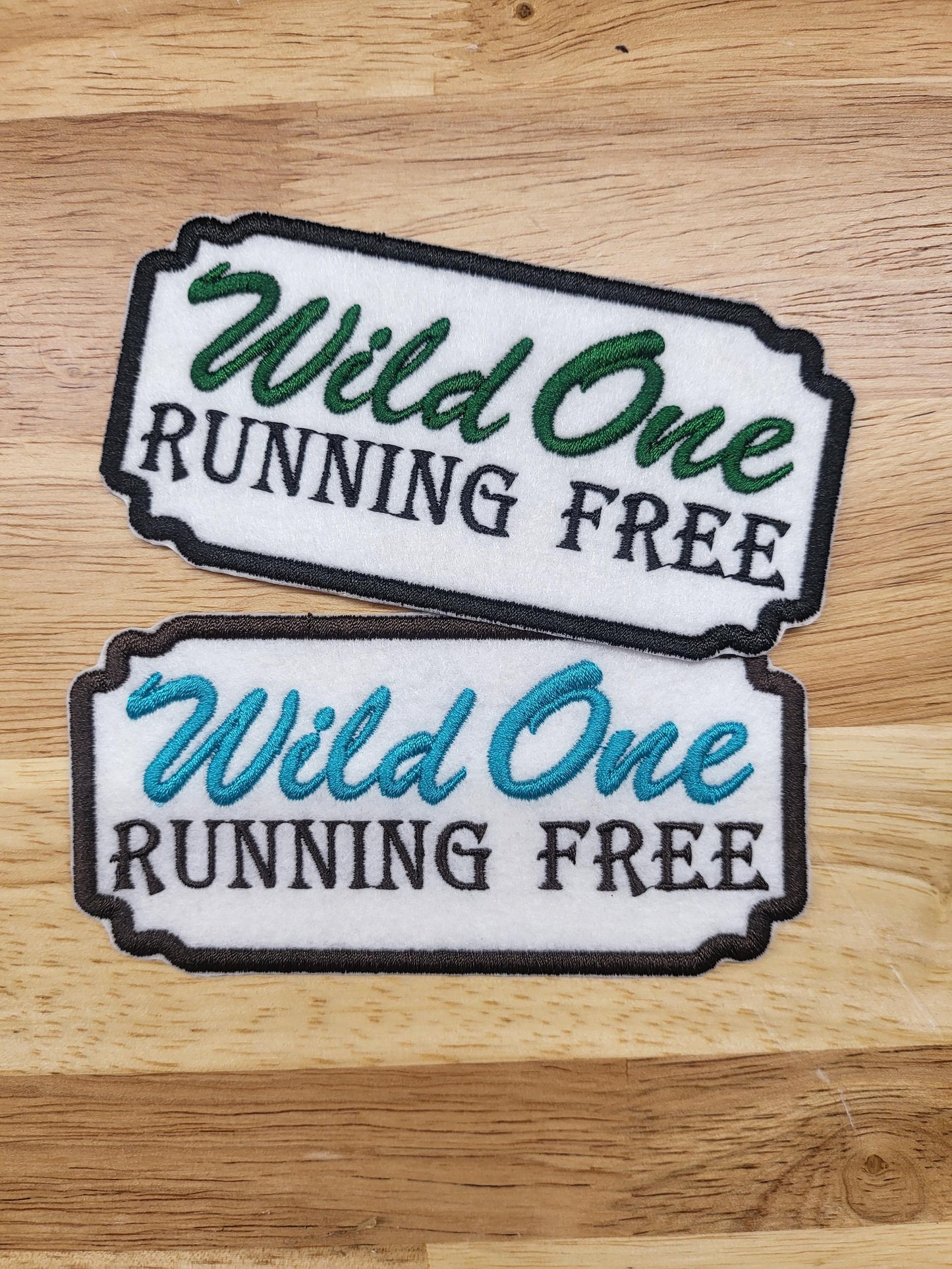 Bulk iron-on embroidered patches in a variety of styles. Embroidered on felt.