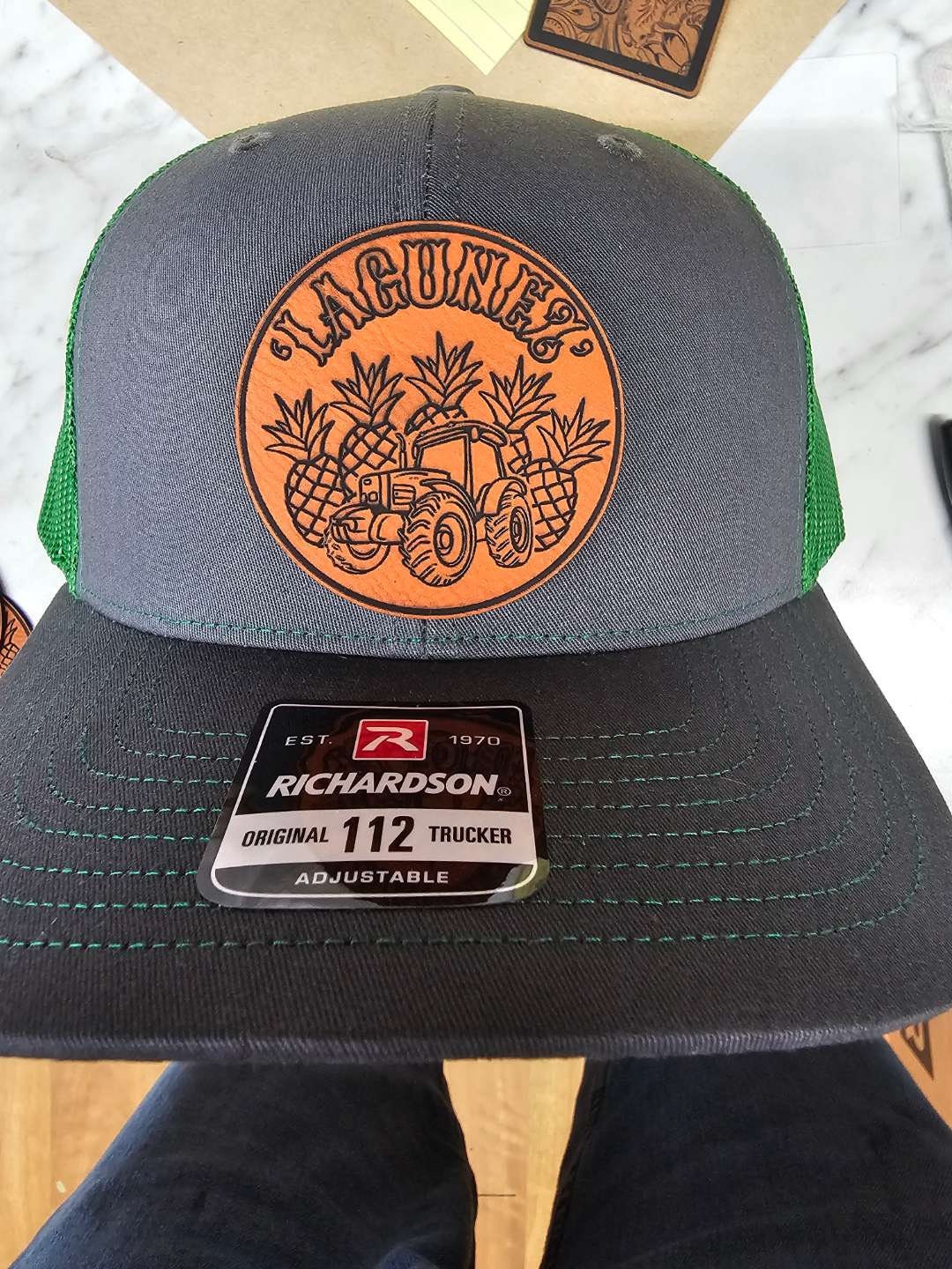 Custom embroidery or leather patch hats on Richardson 112 or 168