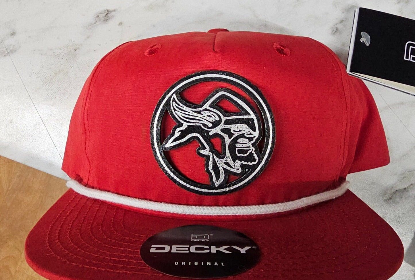 Custom embroidery or leather patch hats on Richardson 112 or 168