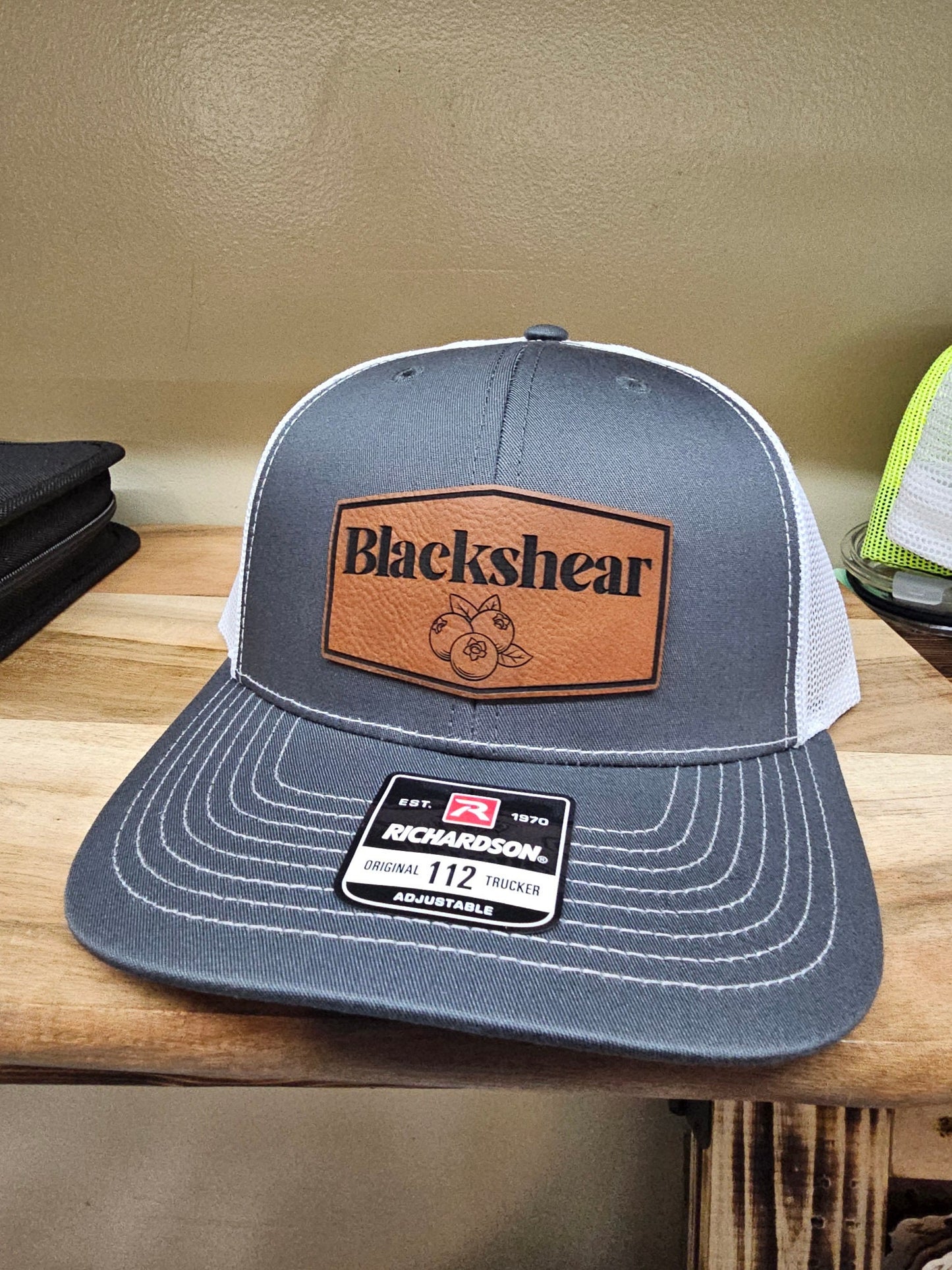 Custom embroidery or leather patch hats on Richardson 112 or 168