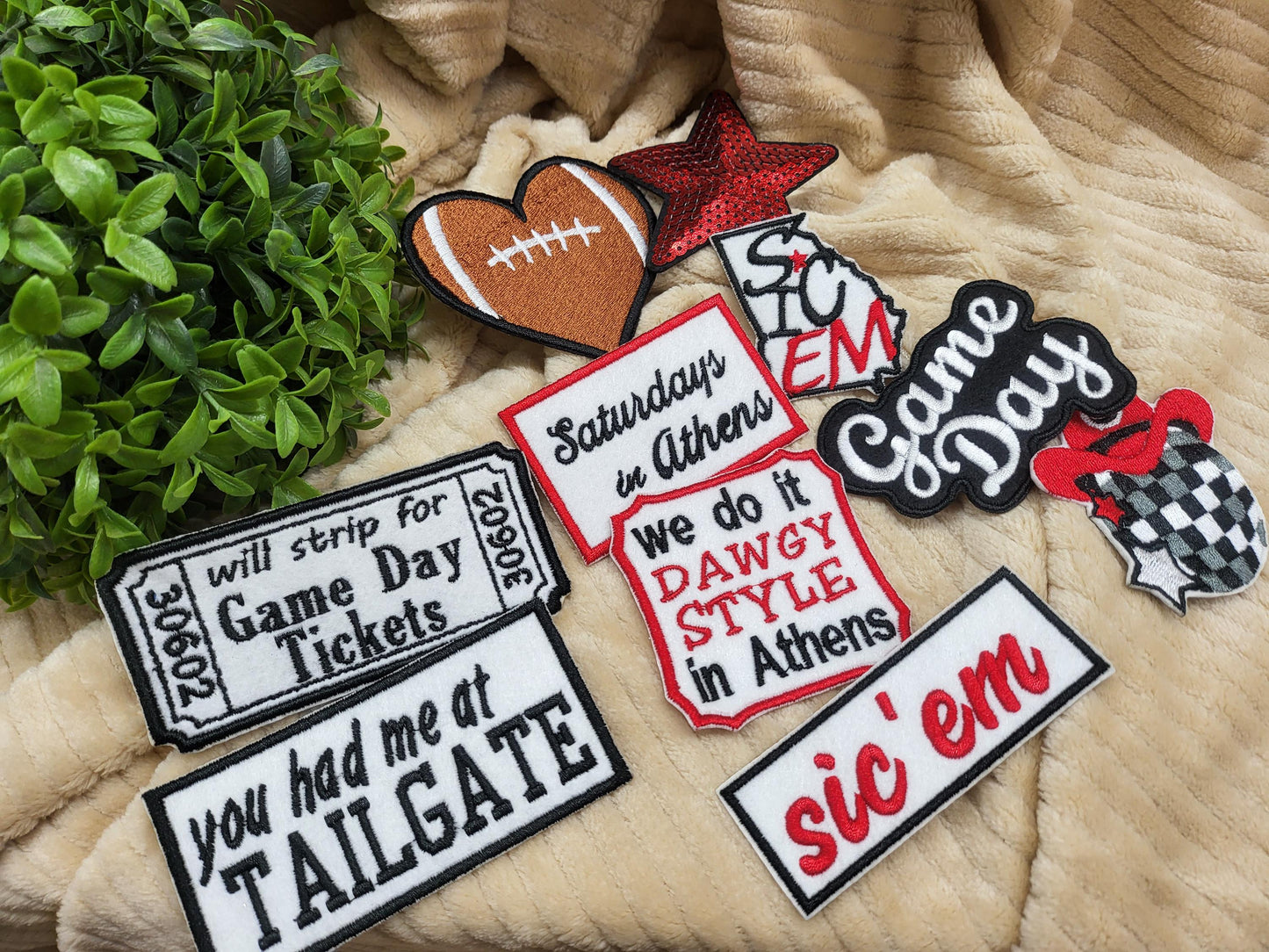 Bulk iron-on embroidered patches in a variety of styles. Embroidered on felt.