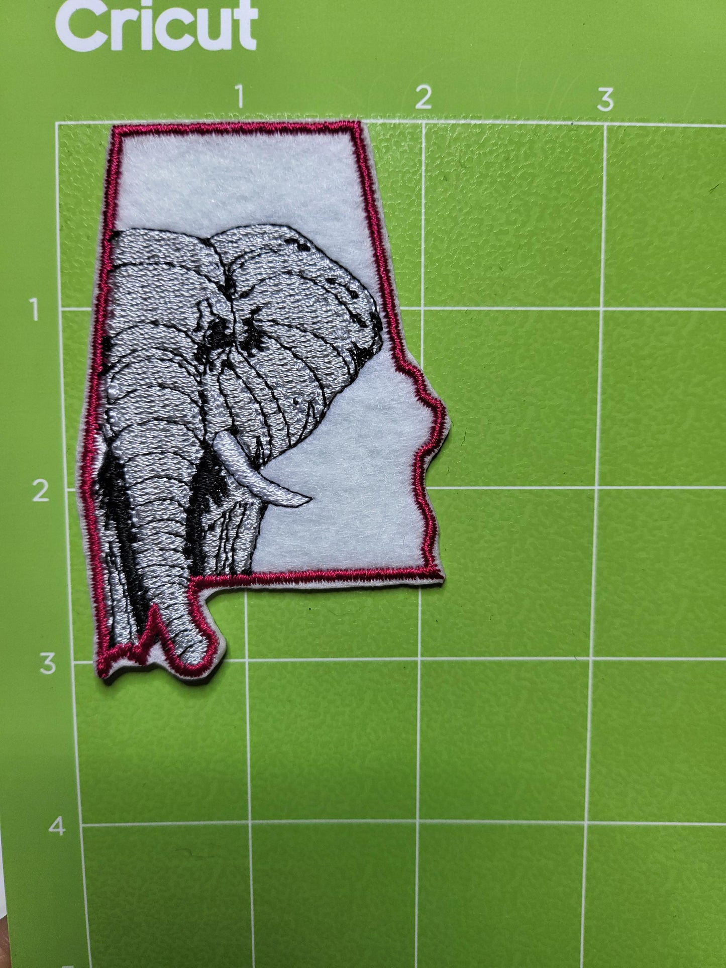 Football in crimson iron-on embroidered patches. Set of 5 or individual patches.