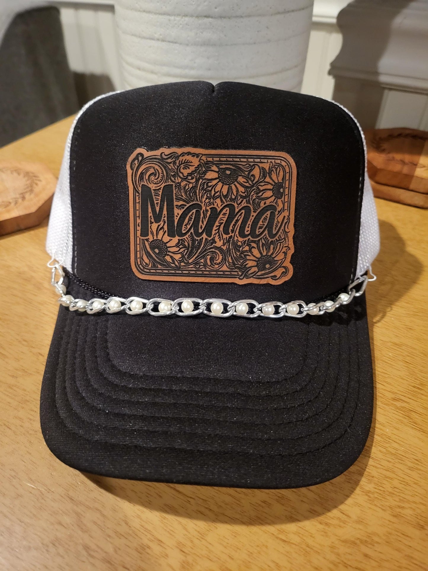 Mama tooled leatherette patch on a foam trucker hat with gold or silver pearl hat chain.