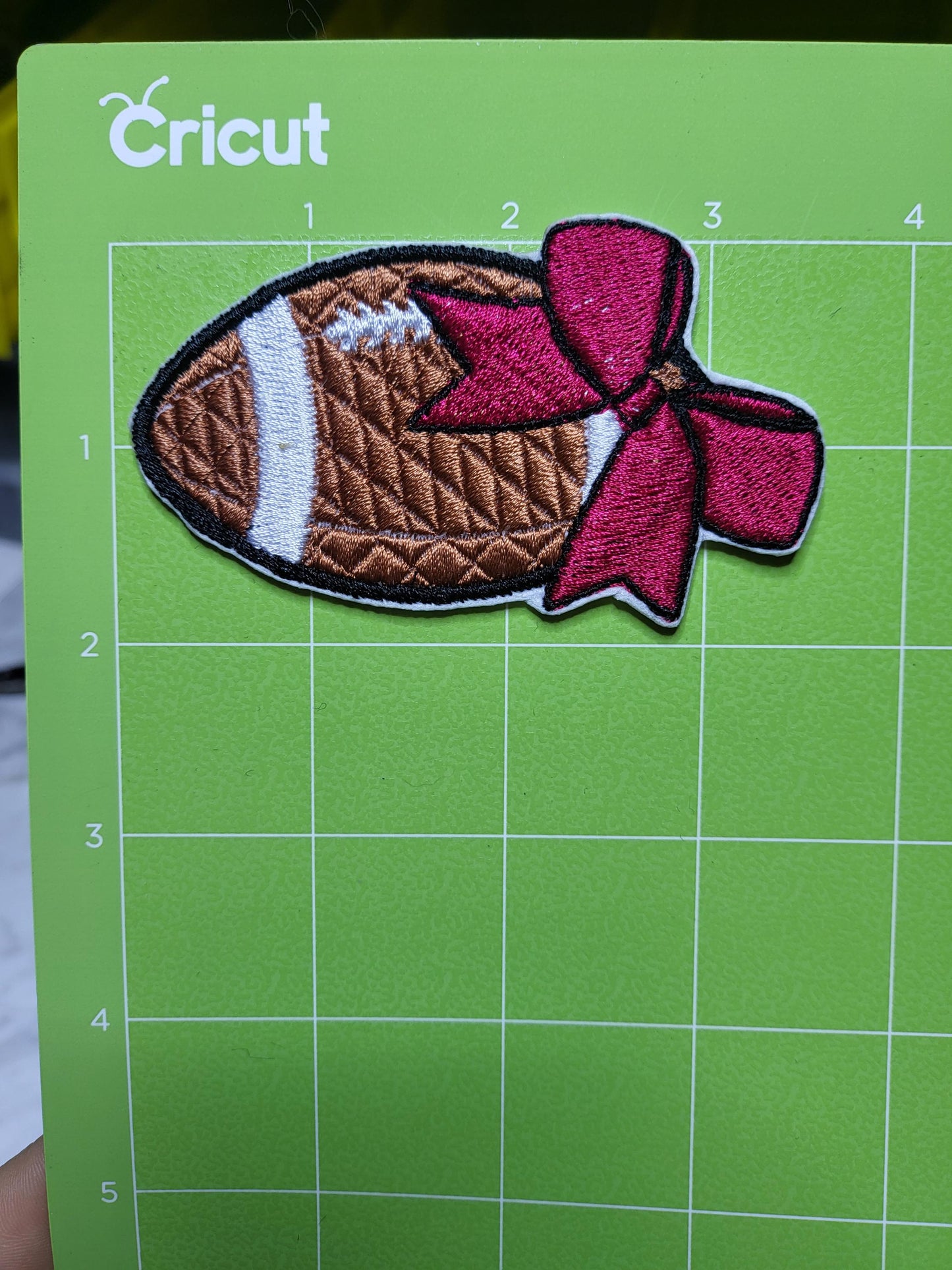 Football in crimson iron-on embroidered patches. Set of 5 or individual patches.