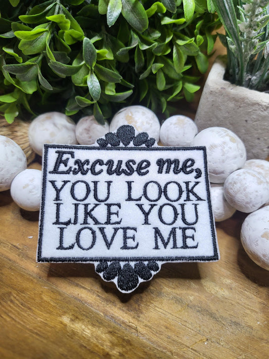 Iron-on embroidered Excuse Me You Look Like You Love Me patch on felt.