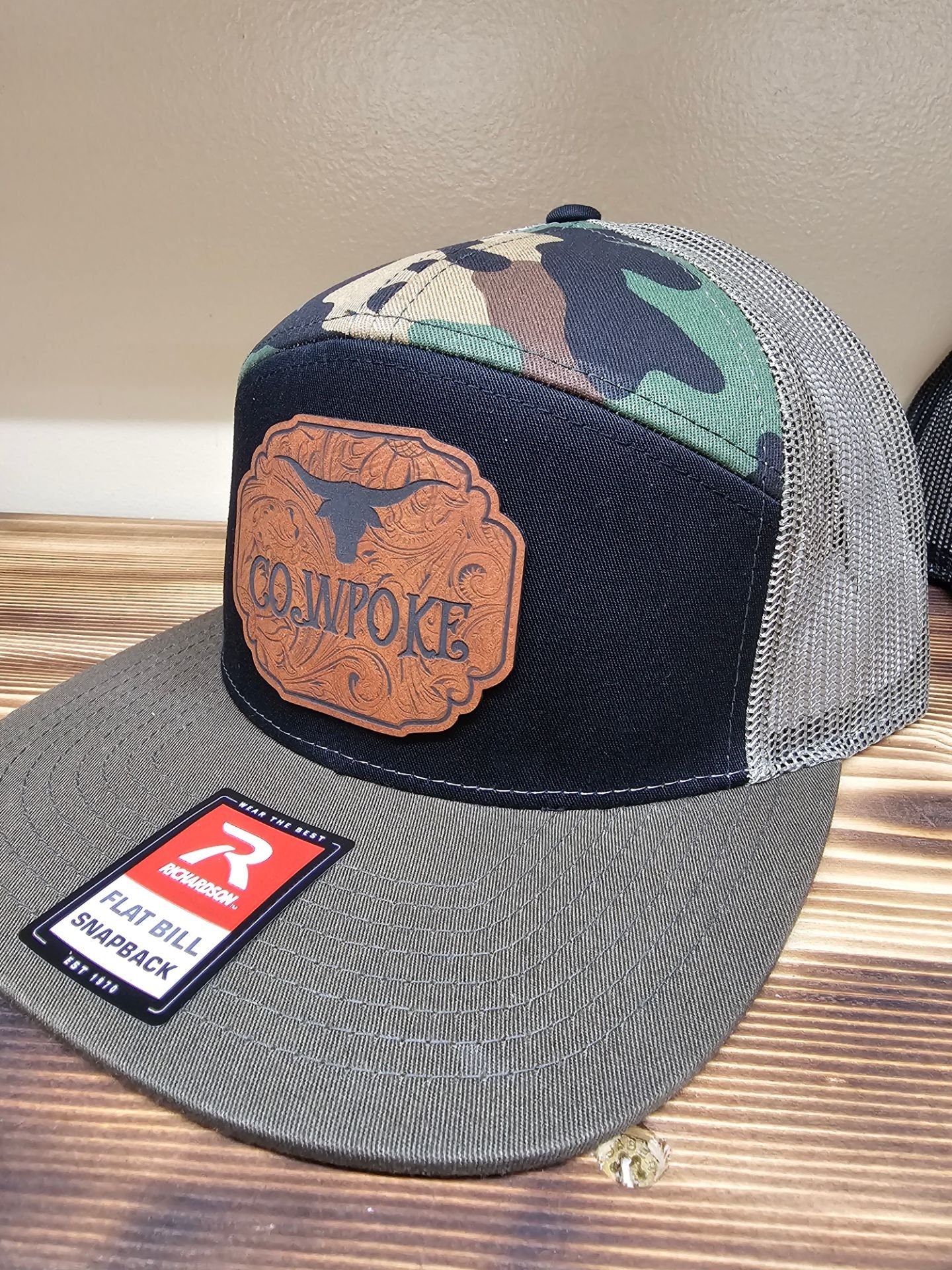 Cowpoke with a tooled-look background leatherette patch on Richardson 112 or 168