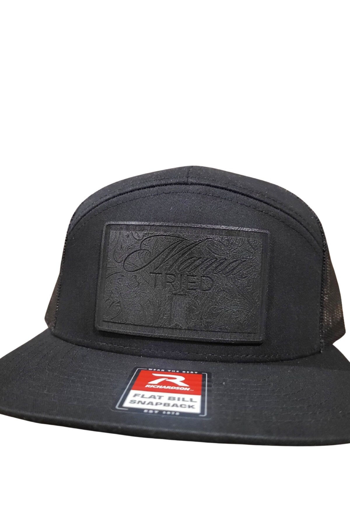 Mama Tried Mama Tried all black leather on a black Richardson 112 trucker round bill or 168 flat bill hat