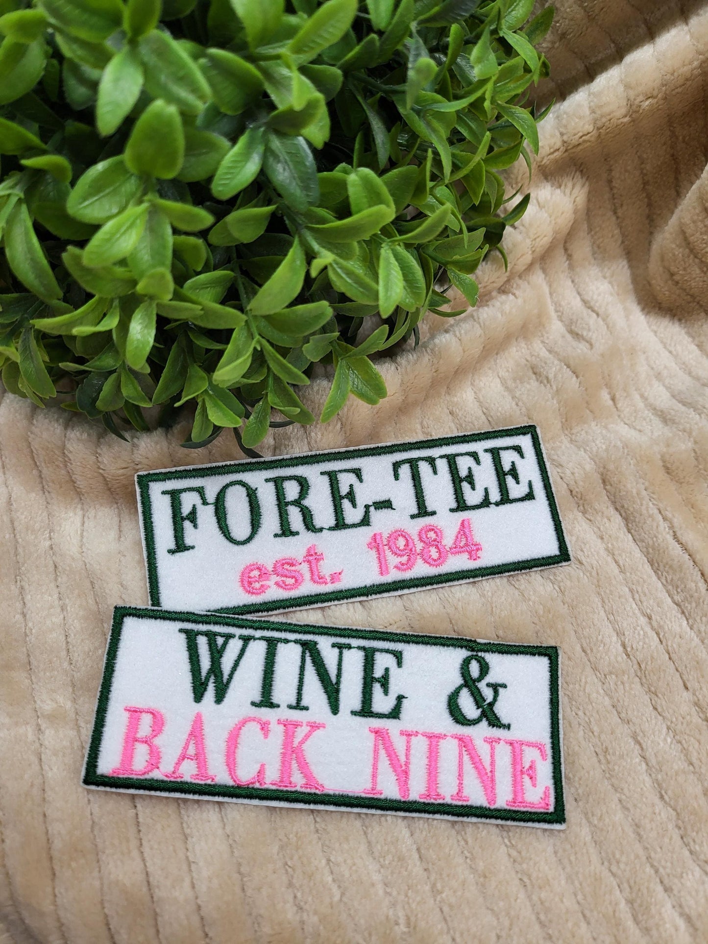 Bulk iron-on embroidered patches in a variety of styles. Embroidered on felt.