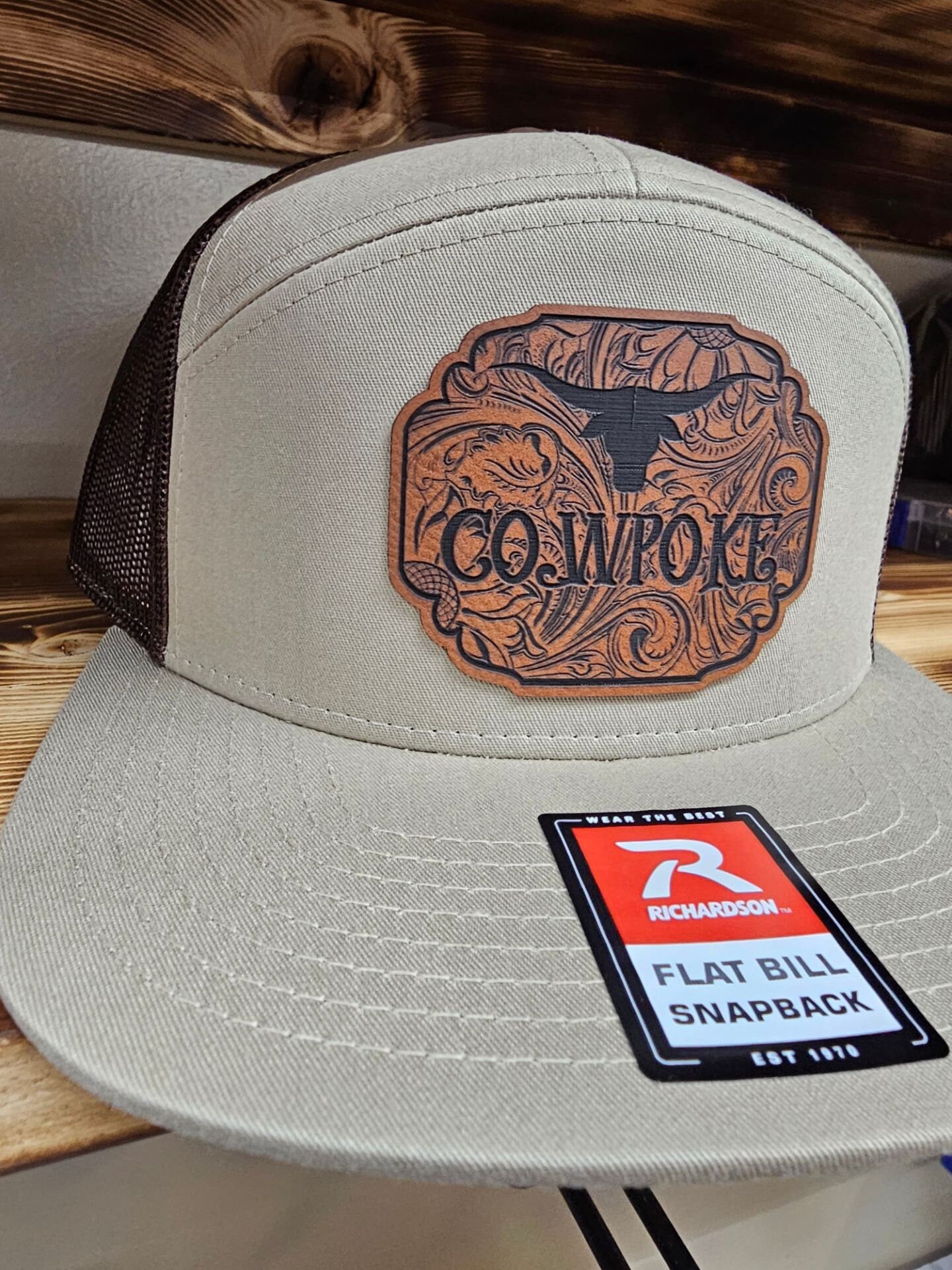 Cowpoke with a tooled-look background leatherette patch on Richardson 112 or 168