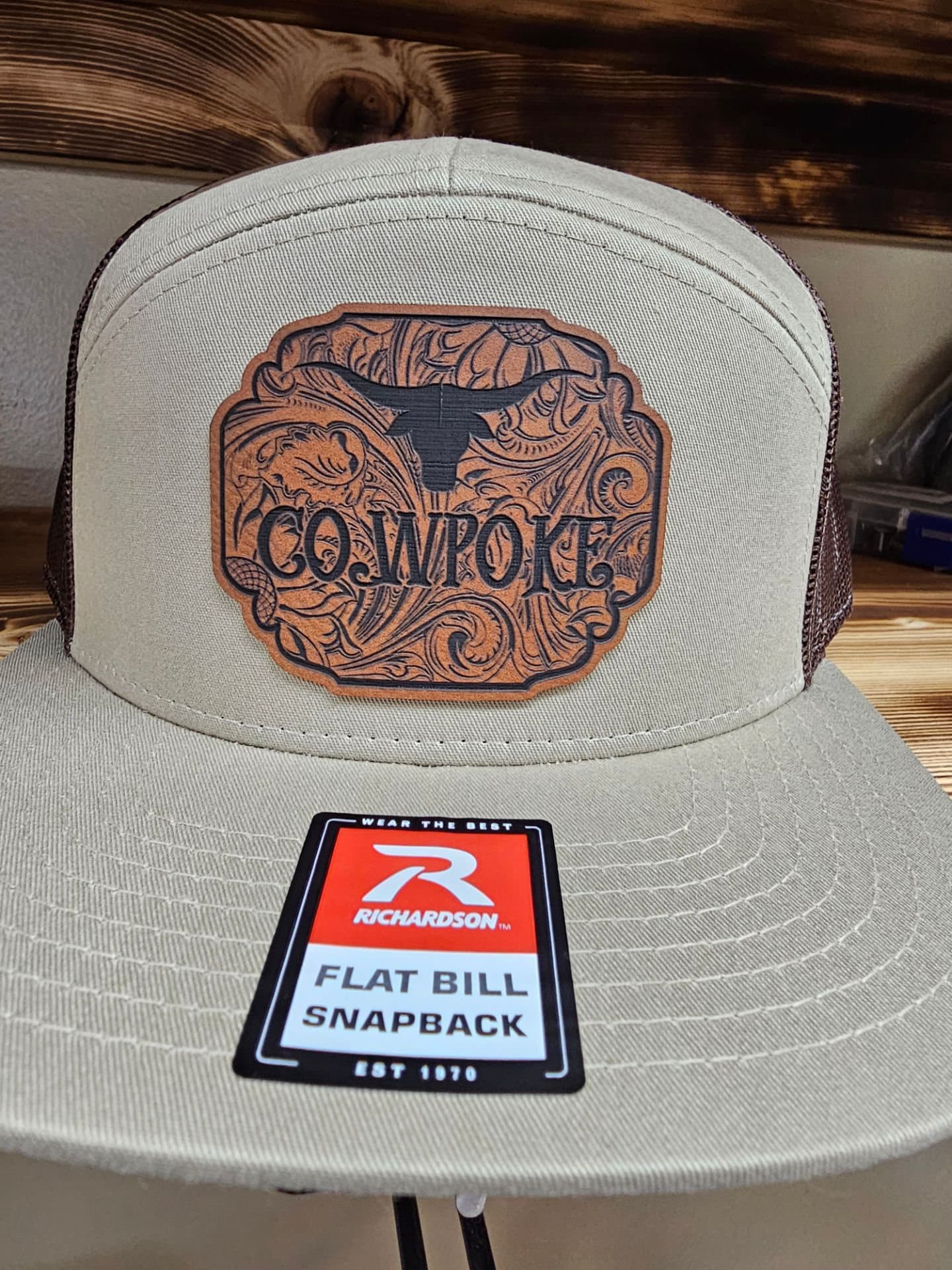 Cowpoke with a tooled-look background leatherette patch on Richardson 112 or 168
