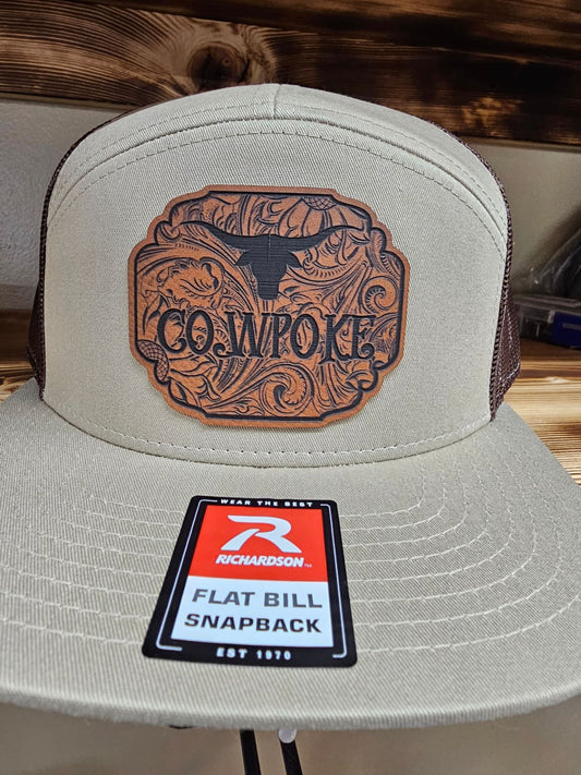 Cowpoke with a tooled-look background leatherette patch on Richardson 112 or 168