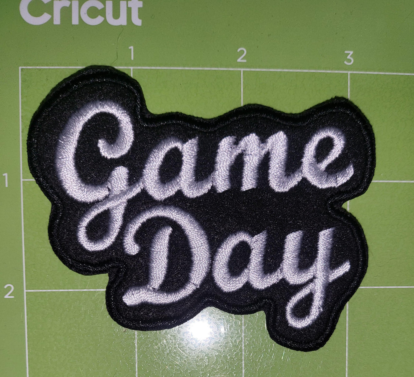 Football in crimson iron-on embroidered patches. Set of 5 or individual patches.