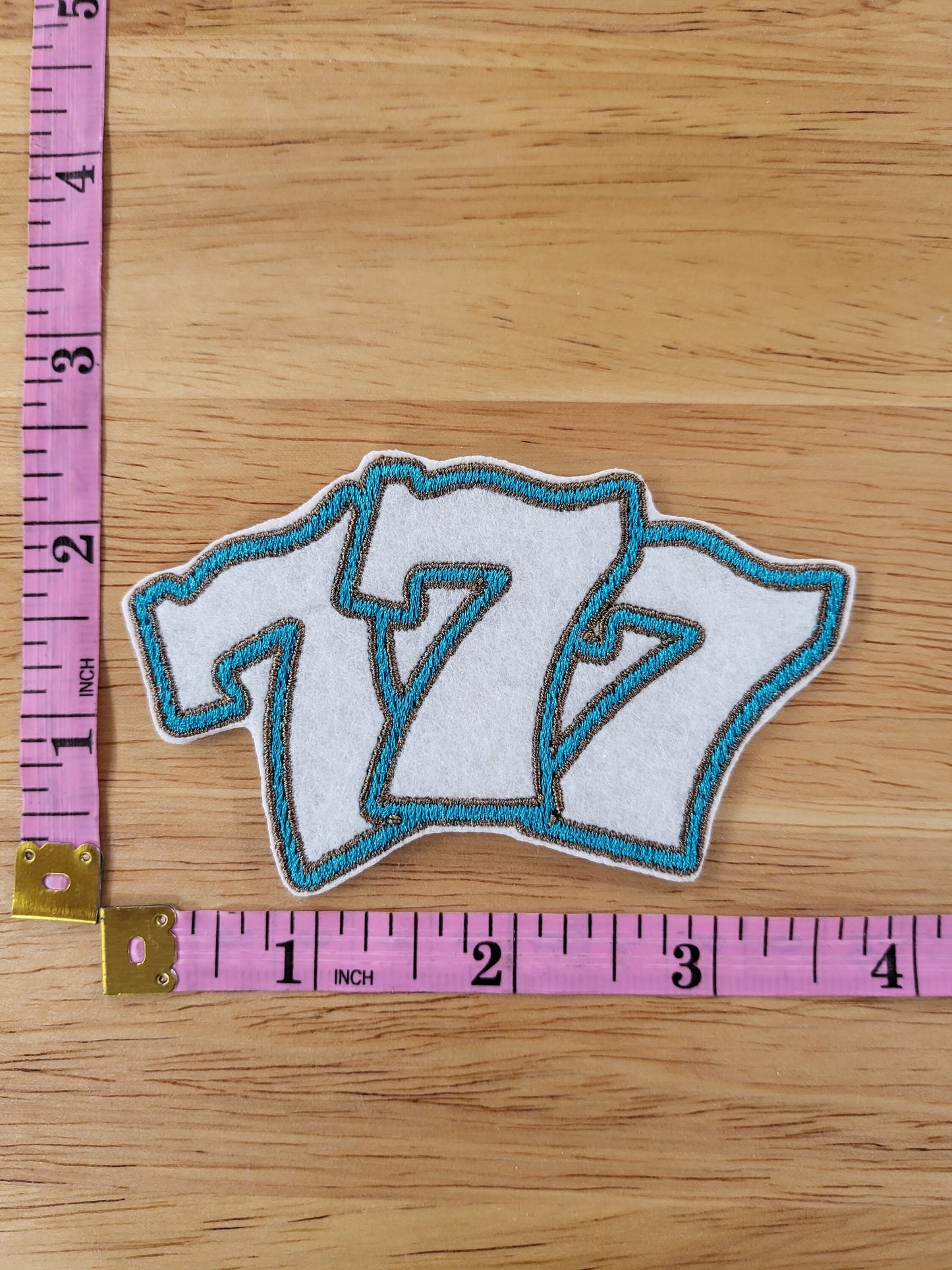 lil' Lucky embroidered iron-on patch set includes 8 ball, dice, Lucky 7s, money bag, and horseshoes.