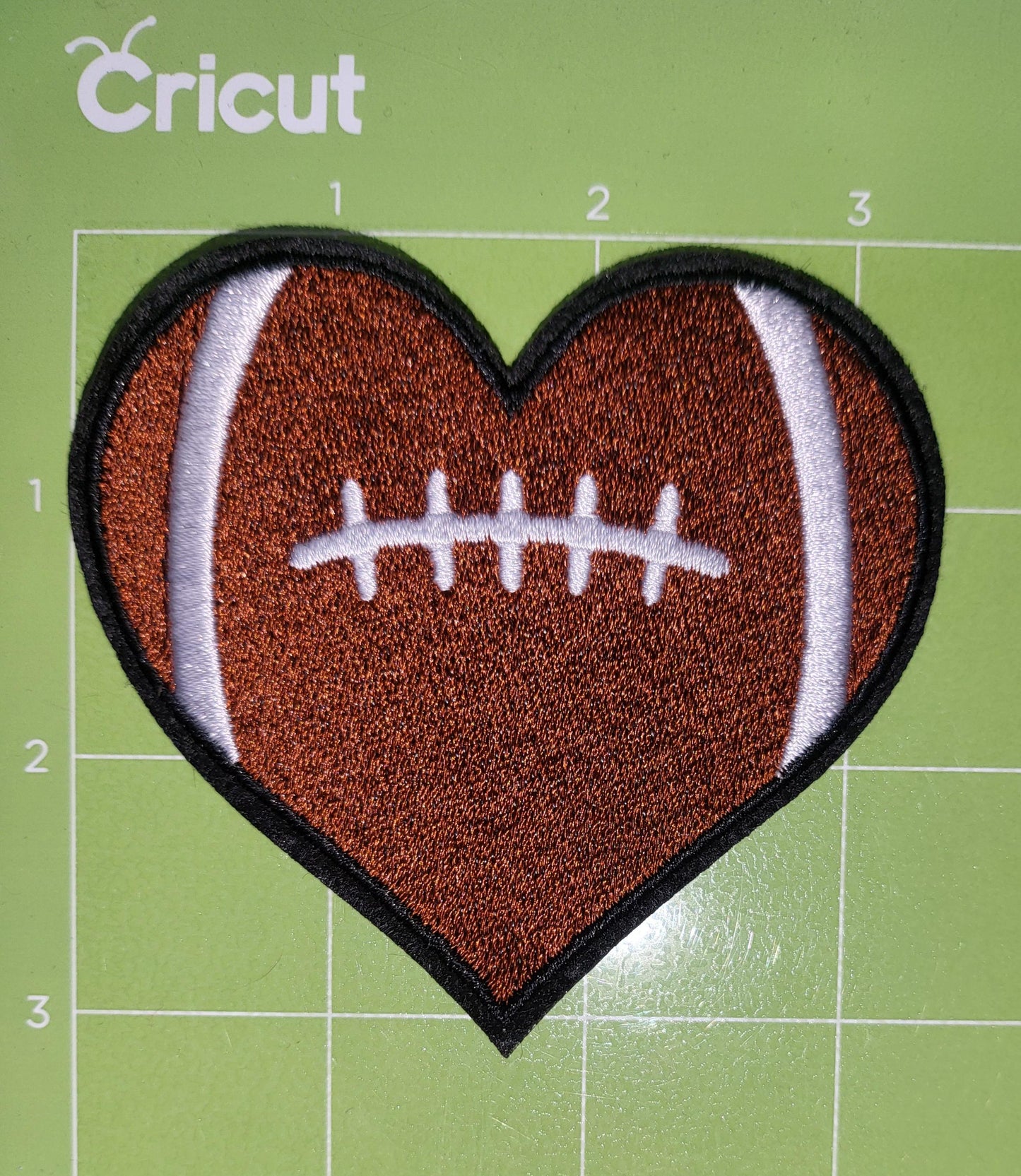 Football in crimson iron-on embroidered patches. Set of 5 or individual patches.