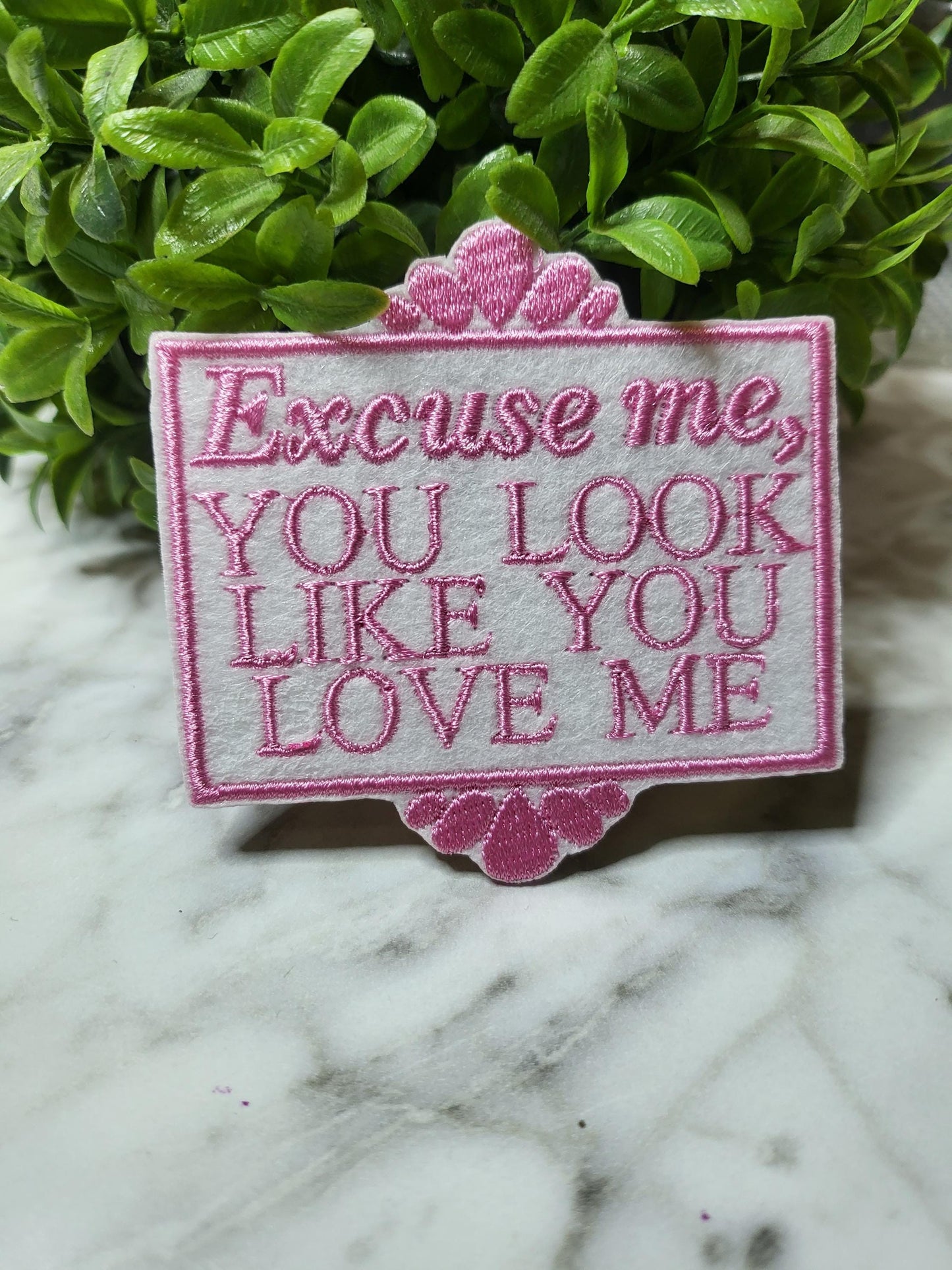 Iron-on embroidered Excuse Me You Look Like You Love Me patch on felt.