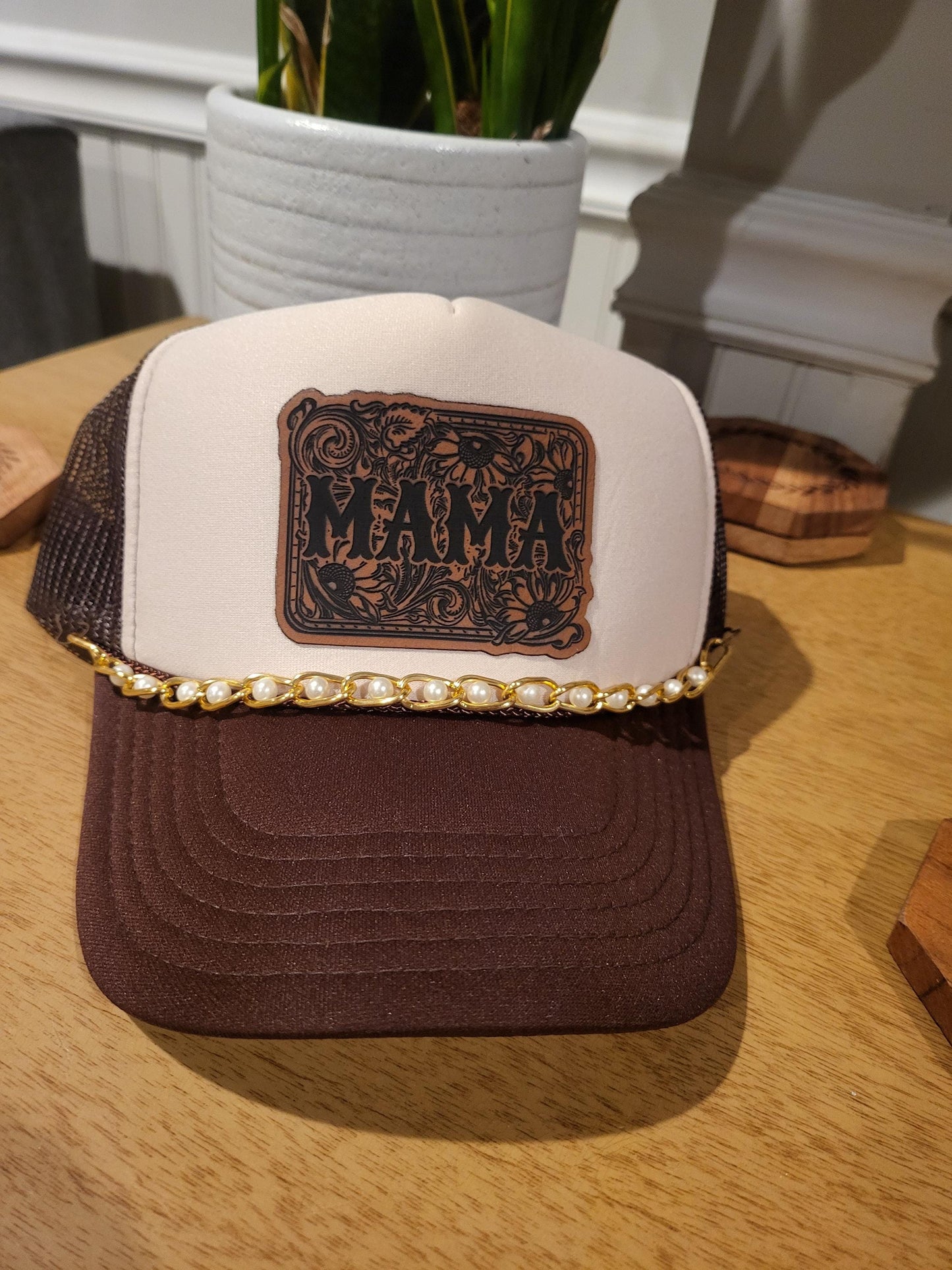 Mama tooled leatherette patch on a foam trucker hat with gold or silver pearl hat chain.