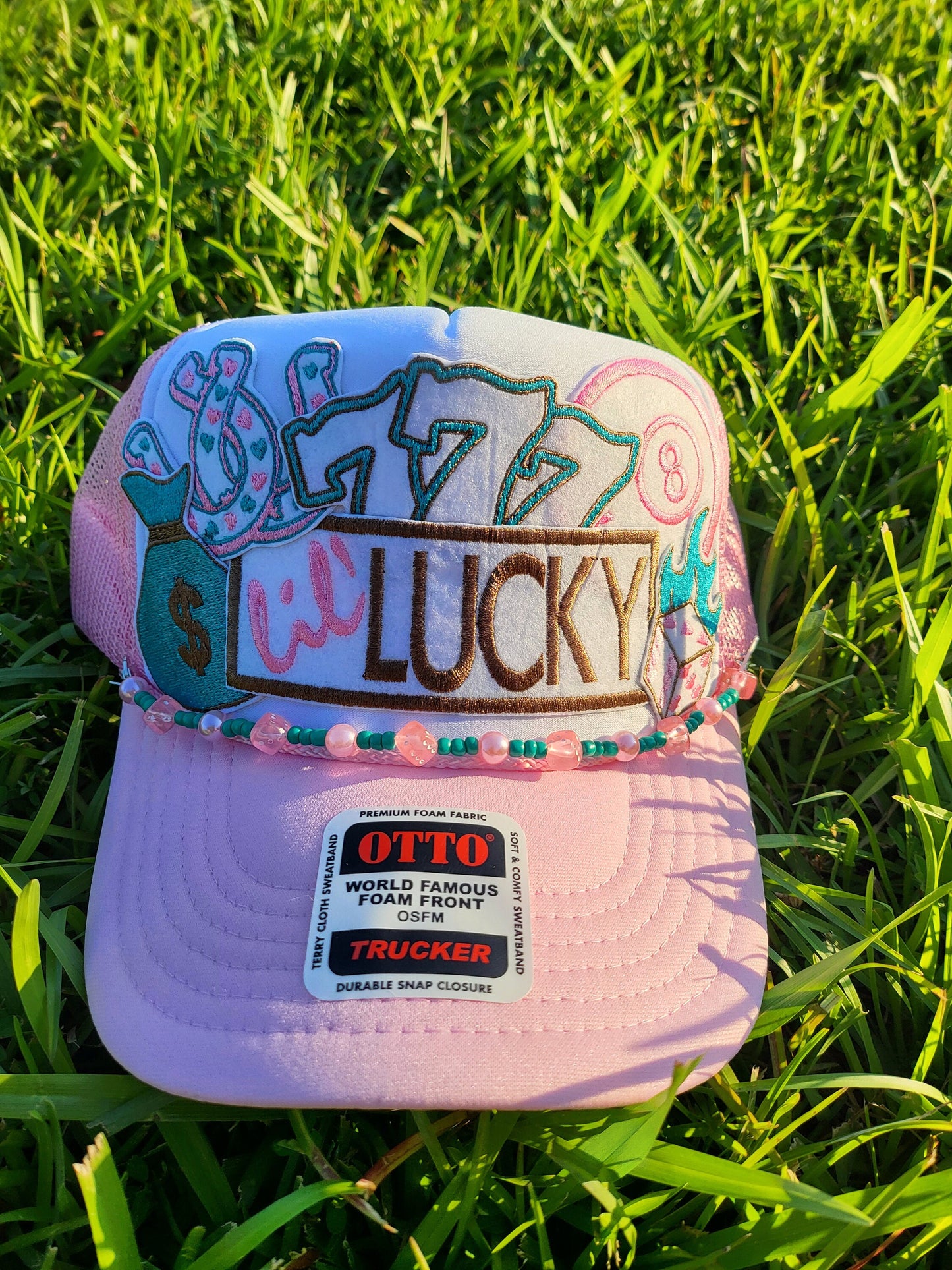 lil' Lucky embroidered iron-on patch set includes 8 ball, dice, Lucky 7s, money bag, and horseshoes.